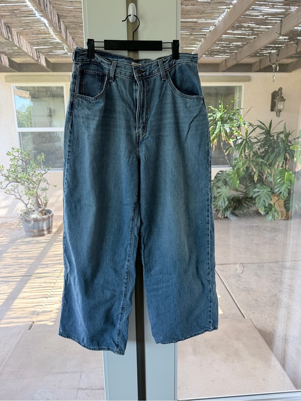 Levi's Wide Leg Flare Jeans in Medium Blue Denim